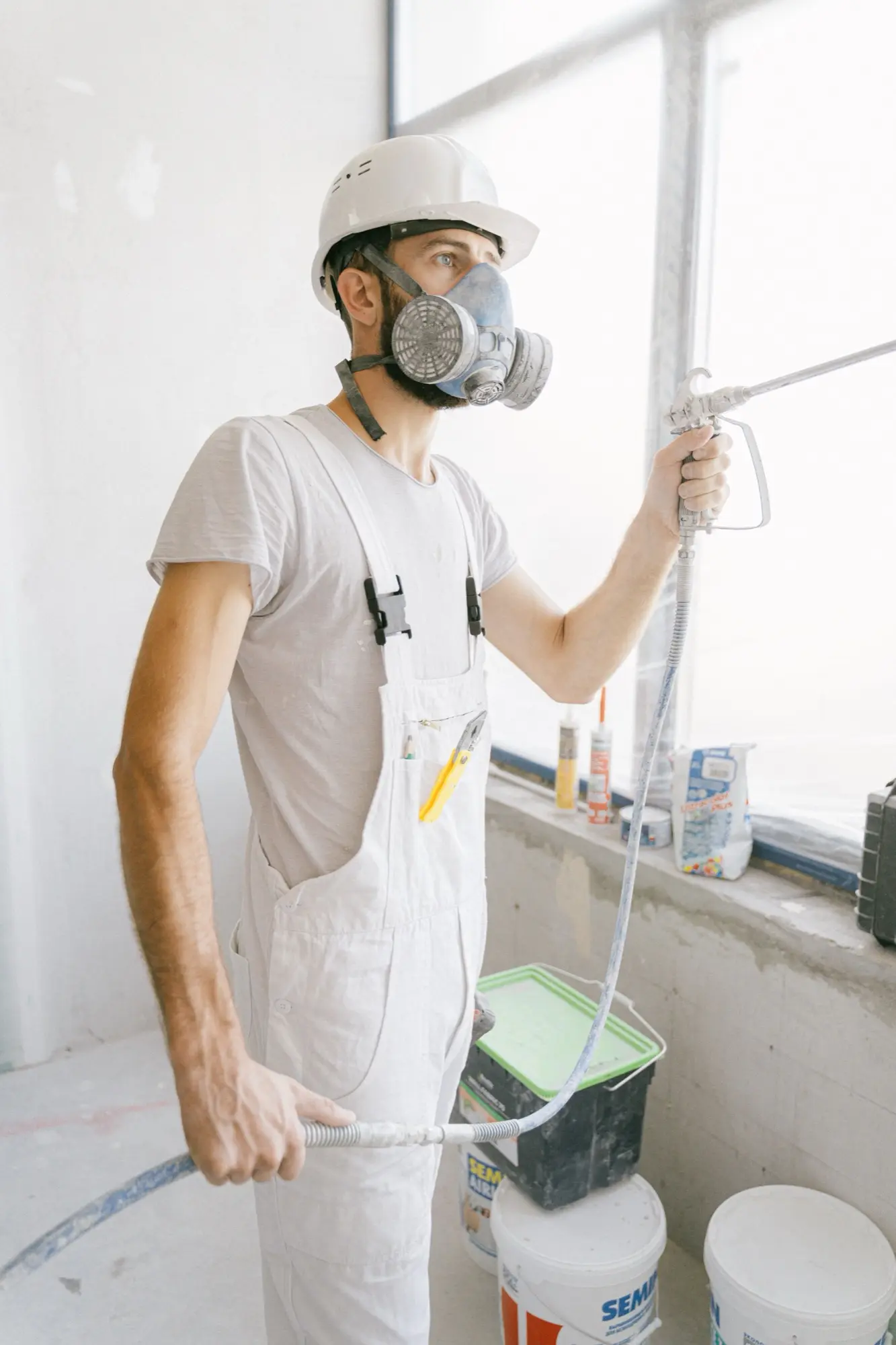 All Star painter cutting in a wall edge by hand