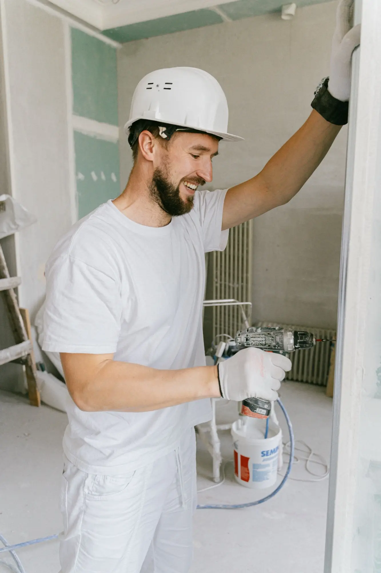 All Star painter rolling a wall on a residential job