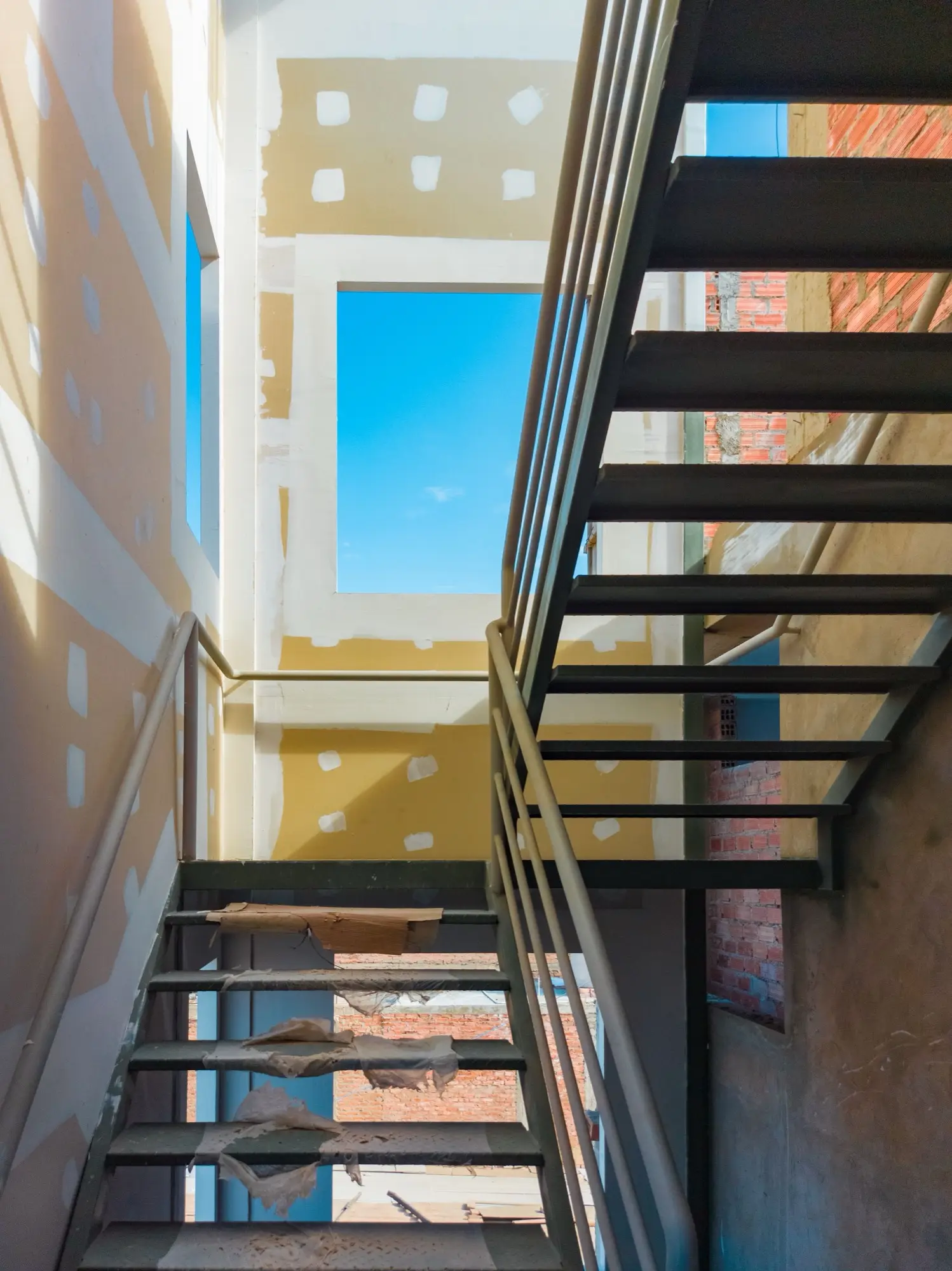 Freshly painted stairwell and void in a commercial building